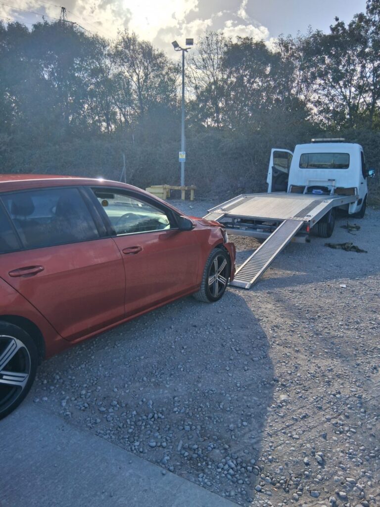 Vehicle Recovery in Newport | car going on truck
